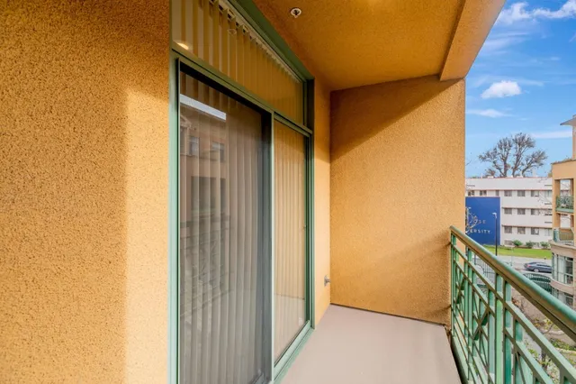 a swimming pool with outdoor seating and yard