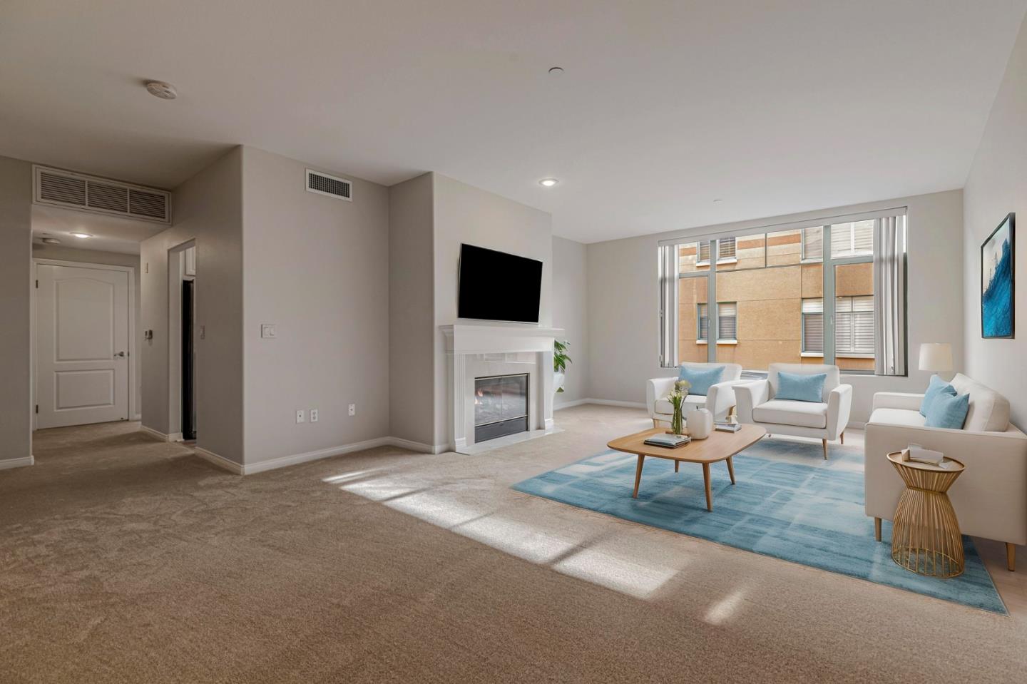 144 South 3rd Street, Unit 433 San Jose, CA 95112 - Photo 5 of 66 a living room with furniture and a flat screen tv