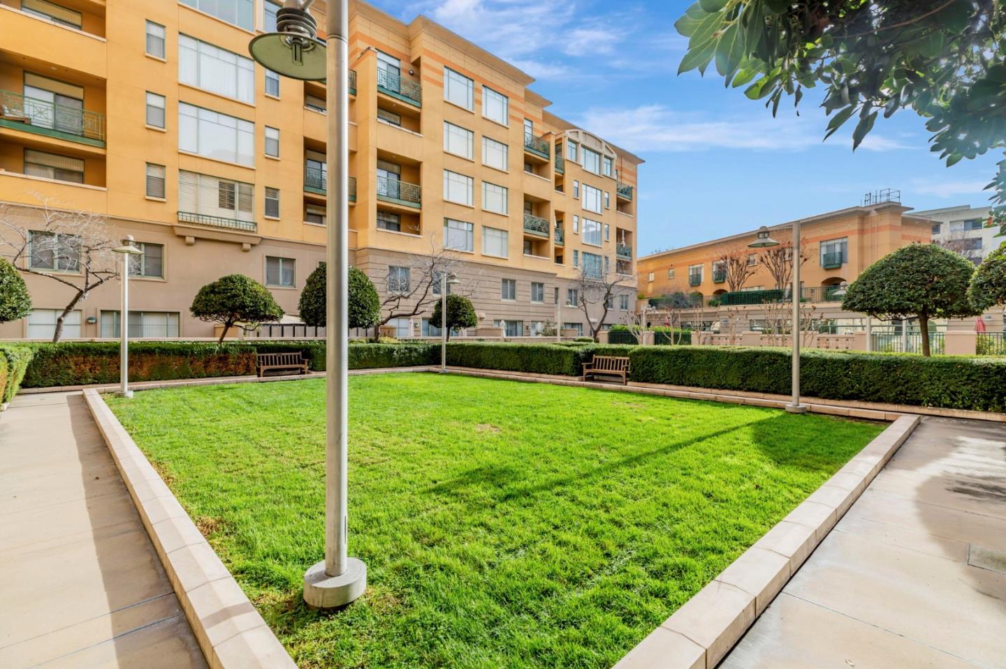 144 South 3rd Street, Unit 433 San Jose, CA 95112 - Photo 51 of 66 a view of a big building with a big yard and potted plants