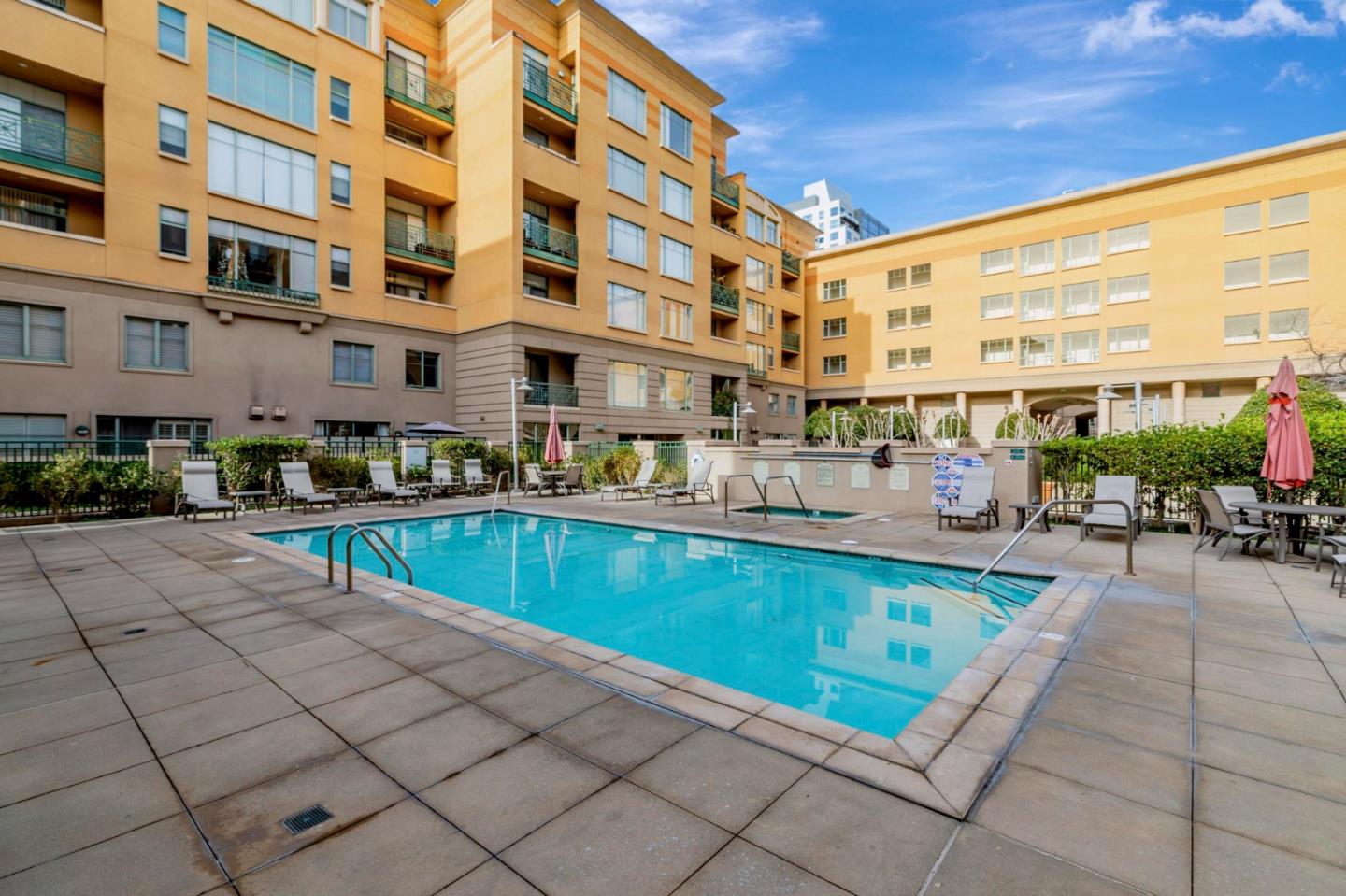 144 South 3rd Street, Unit 433 San Jose, CA 95112 - Photo 58 of 66 a swimming pool with outdoor seating and yard