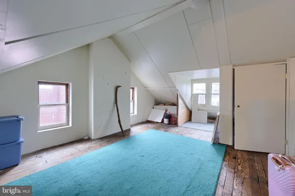 a view of a livingroom with a furniture and a window
