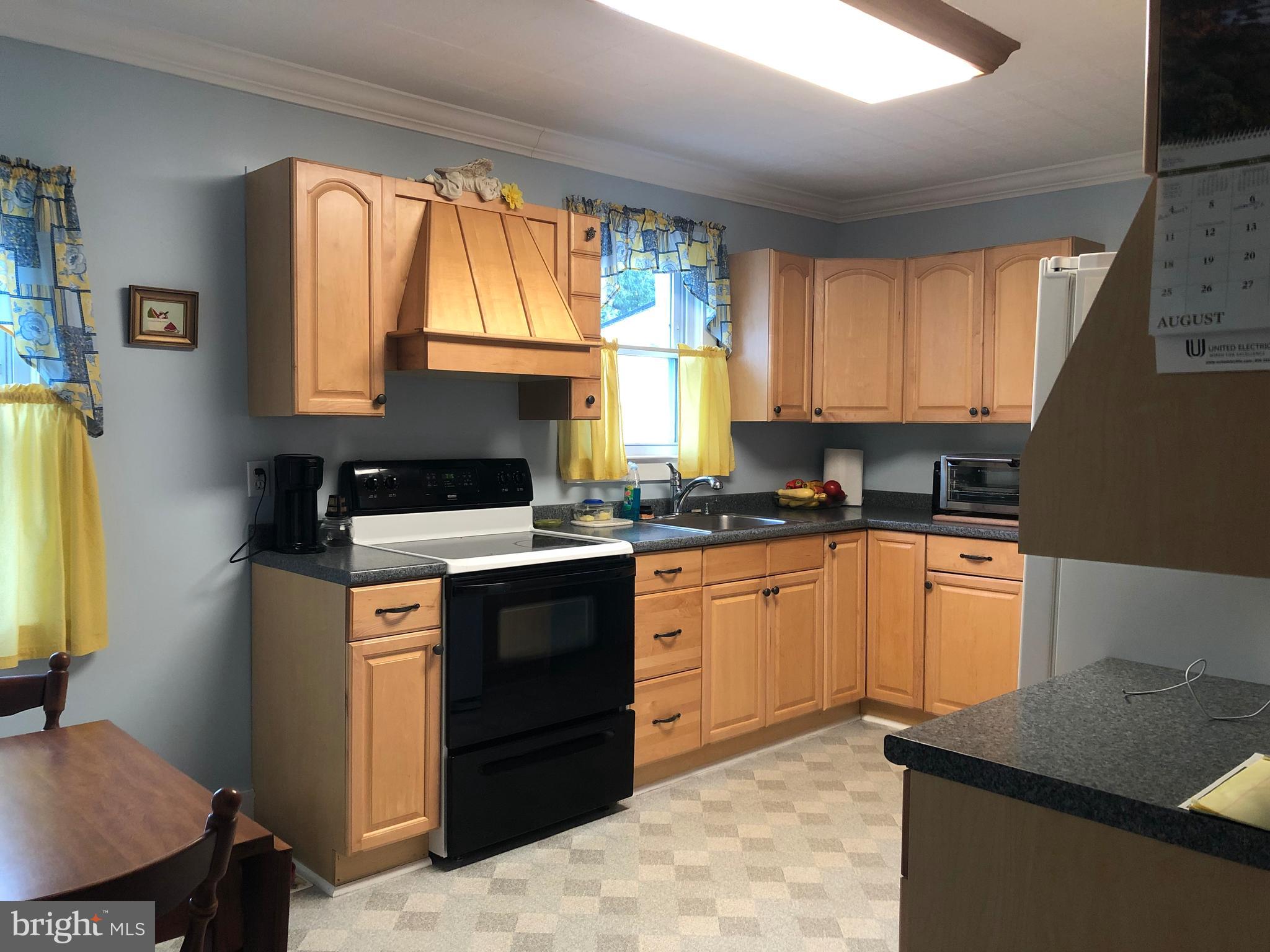 83 East Amwellbury Road Salem, NJ 08079 - Photo 16 of 24 Eat-in Kitchen with Beautiful Maple Cabinets