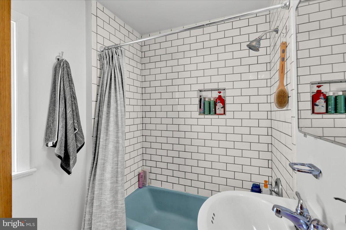 830 Lake Street Lancaster, PA 17603 - Photo 16 of 20 a bathroom with a sink toilet and shower