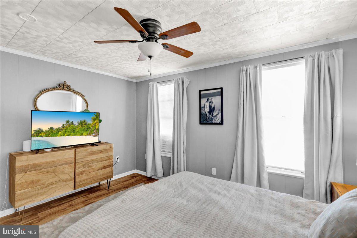 830 Lake Street Lancaster, PA 17603 - Photo 19 of 20 a bedroom with a bed and a dresser next to a window