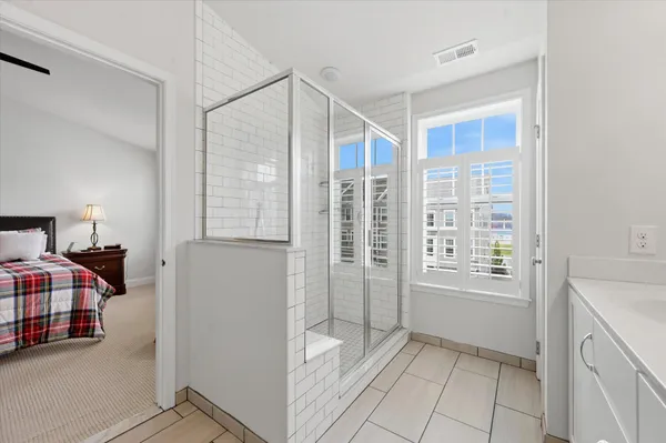 a view of room with window and walk in closet