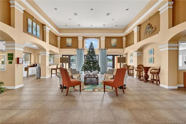 a view of a patio with couches table and chairs