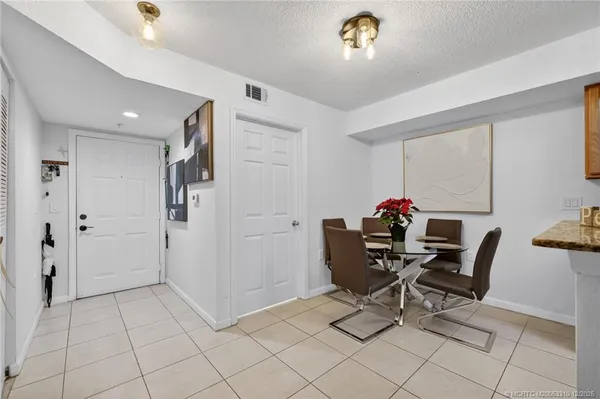 a view of a workspace with furniture