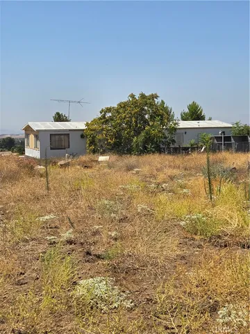 a bathroom with a sink and a yard