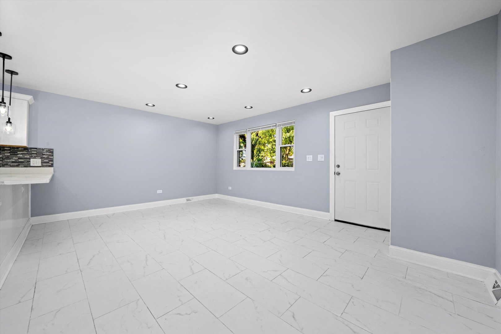 5151 South Emerald Avenue Chicago, IL 60609 - Photo 12 of 24 a view of an empty room with a window