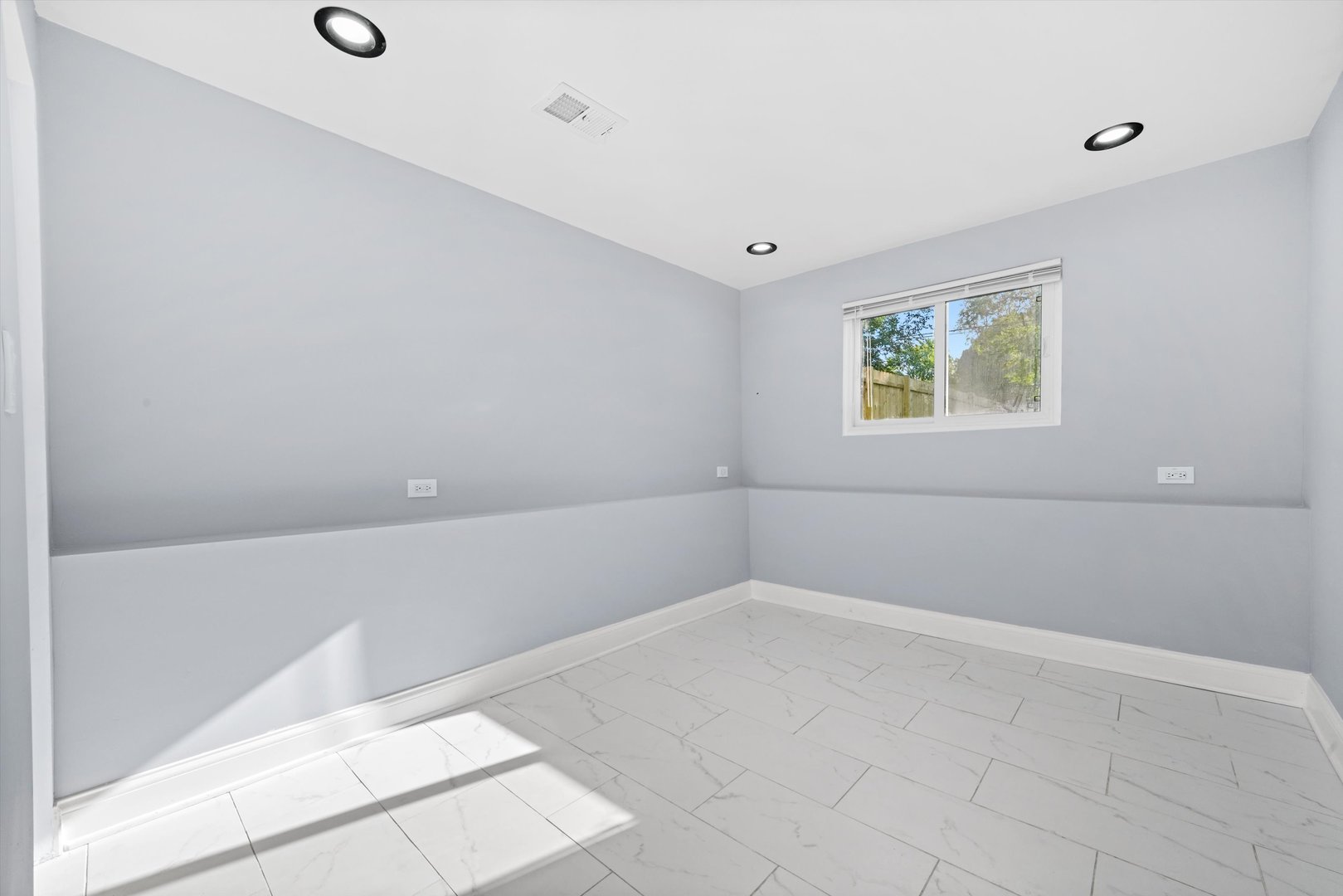 5151 South Emerald Avenue Chicago, IL 60609 - Photo 15 of 24 a view of an empty room with a window