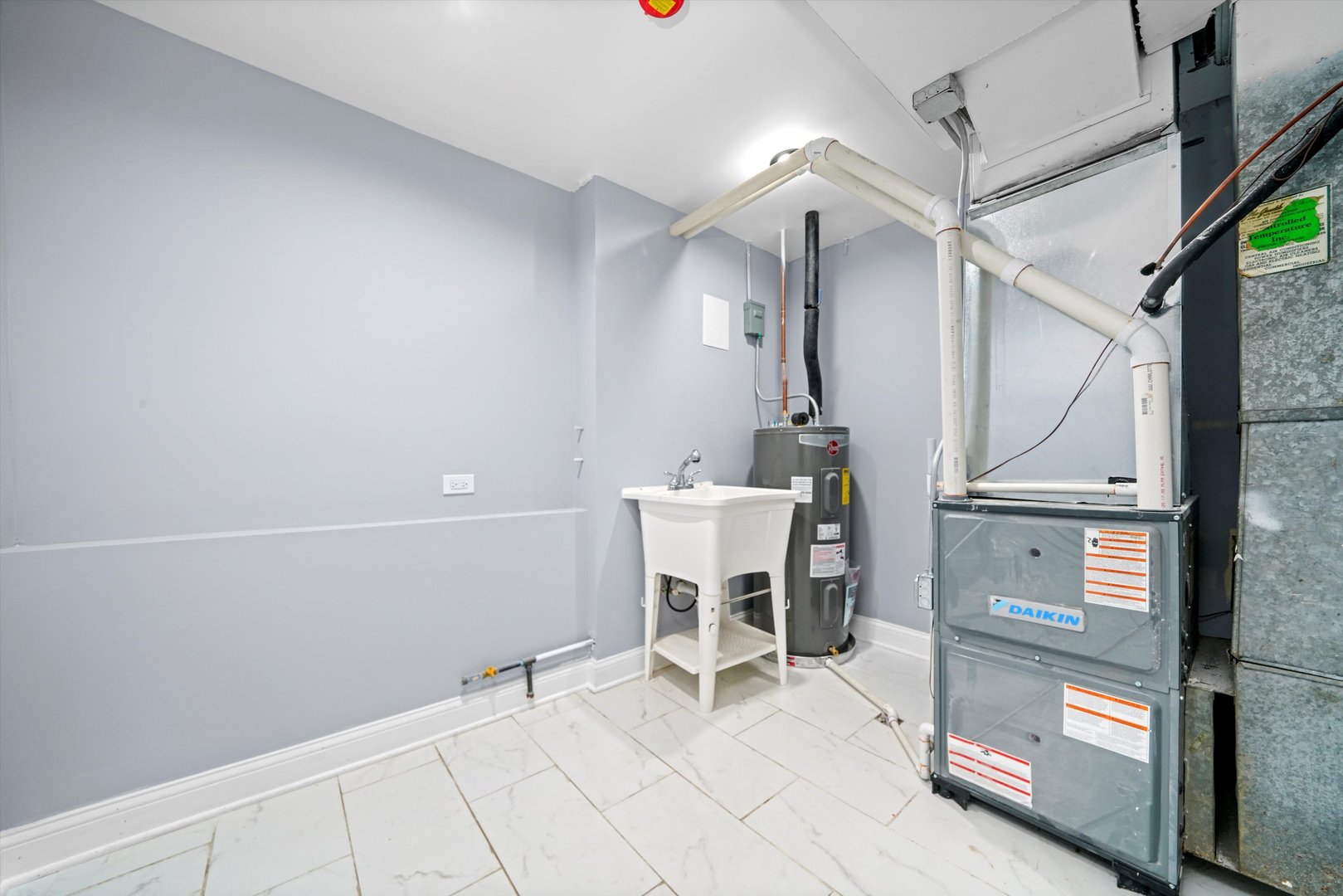 5151 South Emerald Avenue Chicago, IL 60609 - Photo 17 of 24 a view of a room with shelves