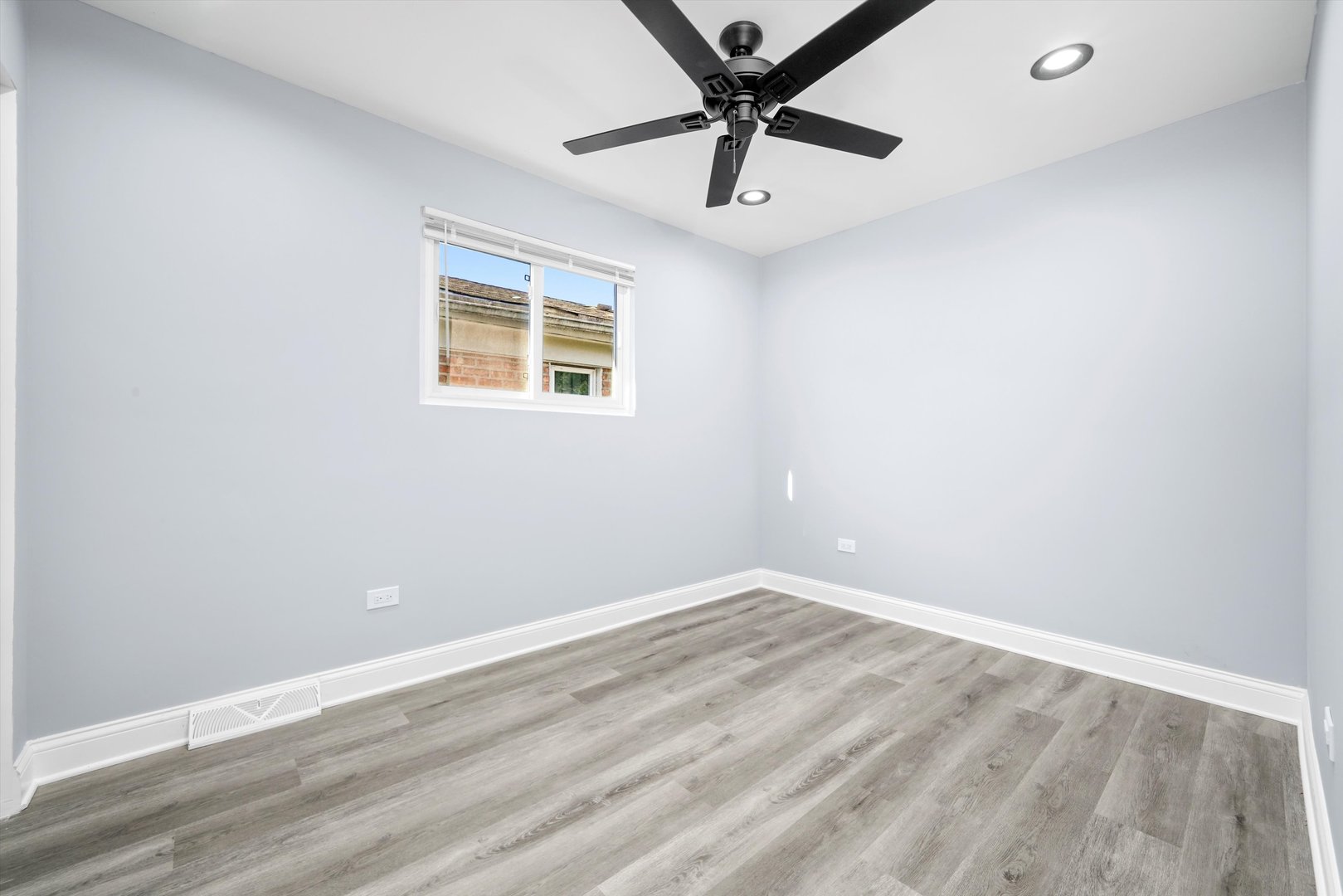 5151 South Emerald Avenue Chicago, IL 60609 - Photo 19 of 24 an empty room with a window