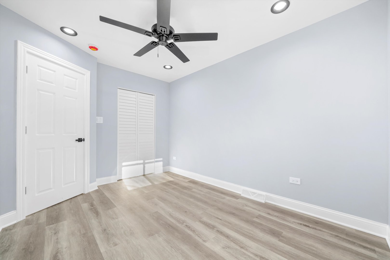 5151 South Emerald Avenue Chicago, IL 60609 - Photo 22 of 24 wooden floor in an empty room