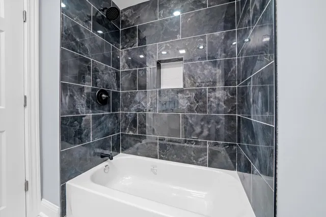 a bathroom with a bathtub