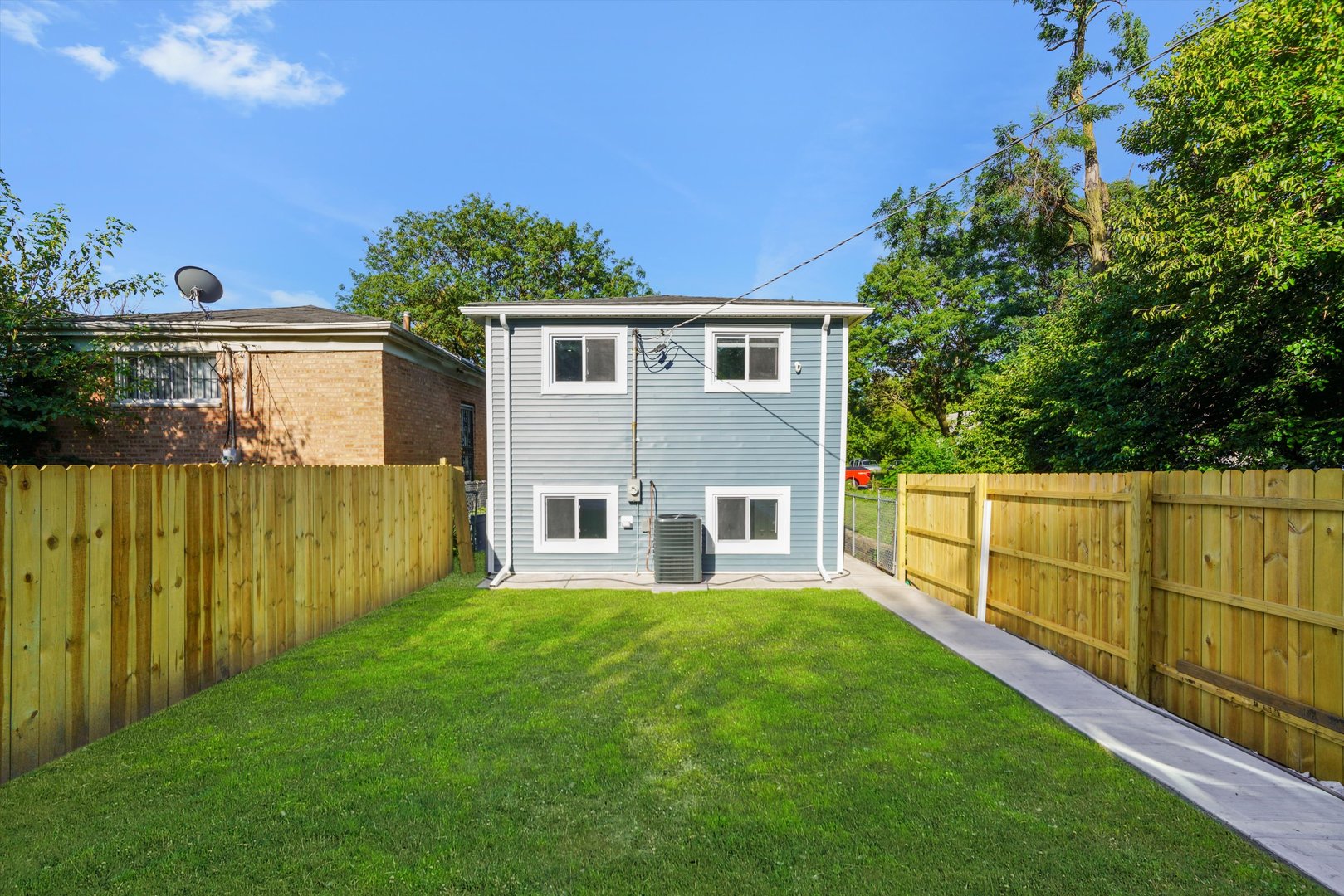 5151 South Emerald Avenue Chicago, IL 60609 - Photo 8 of 24 a house view with a garden space