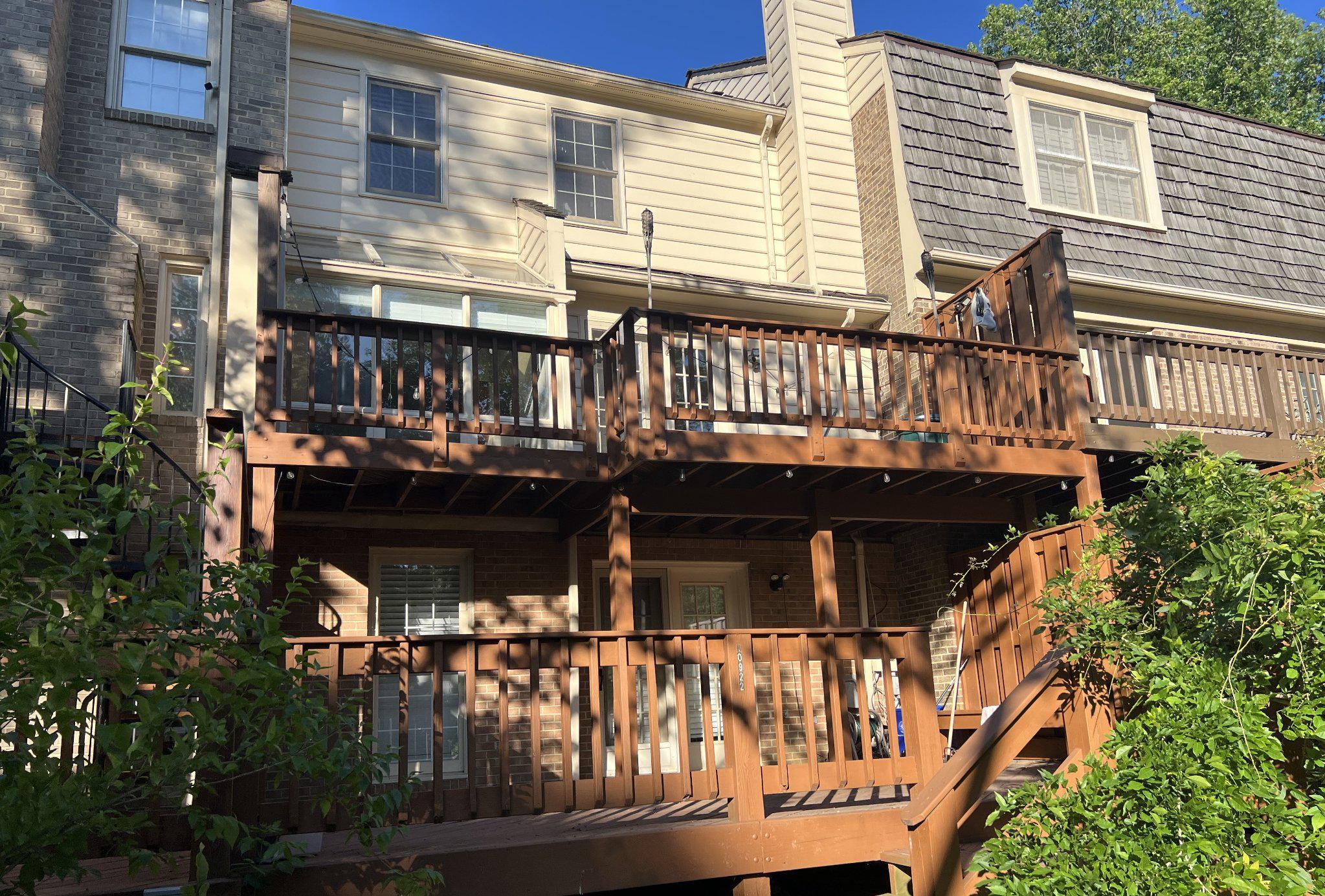 10922 Brewer House Road Rockville, MD 20852 - Photo 23 of 24 Two-tier deck in a serene setting.