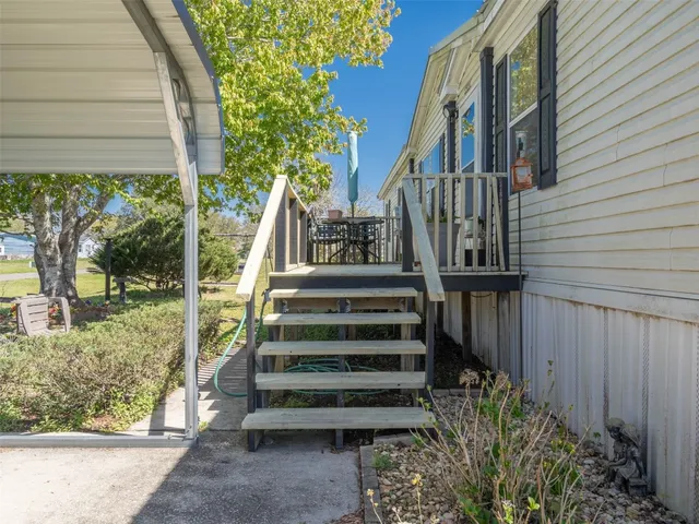 a view of stairs and yard