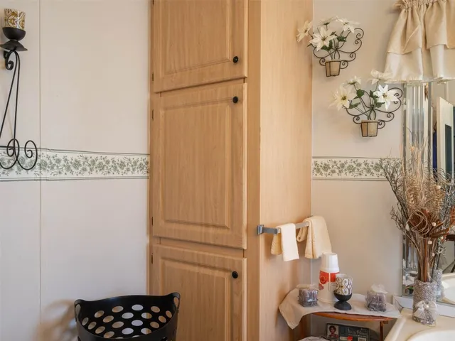 a bathroom with a shower curtain and a sink