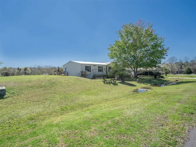 a view of an outdoor space and swimming pool