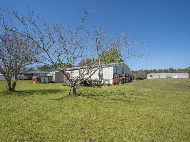 a house view with a garden space