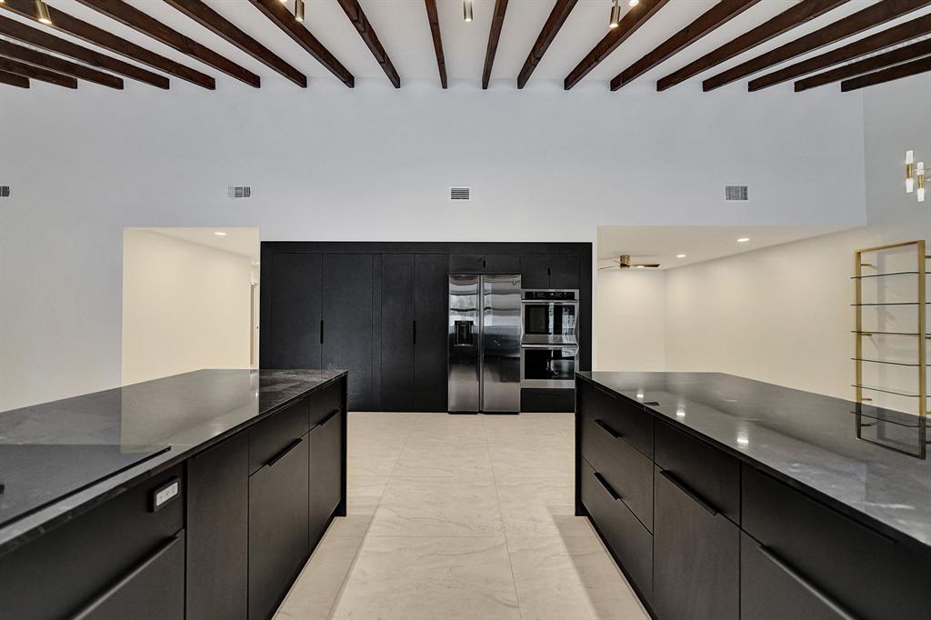 3501 North Park Road Hollywood, FL 33021 - Photo 17 of 55 a kitchen with counter top space cabinets and stainless steel appliances