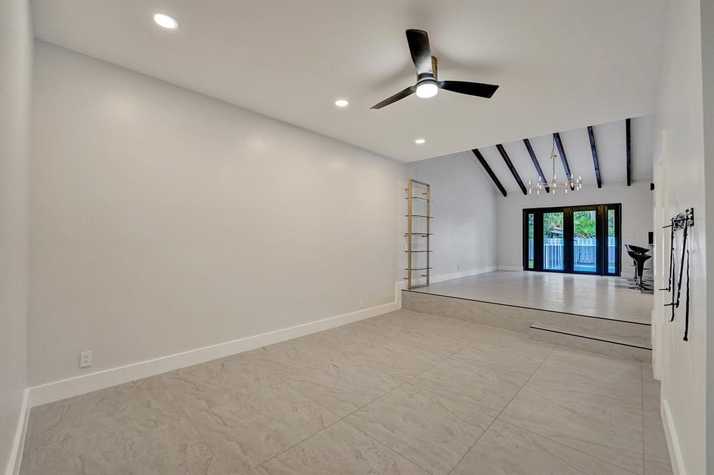 3501 North Park Road Hollywood, FL 33021 - Photo 21 of 55 wooden floor in an empty room with a window