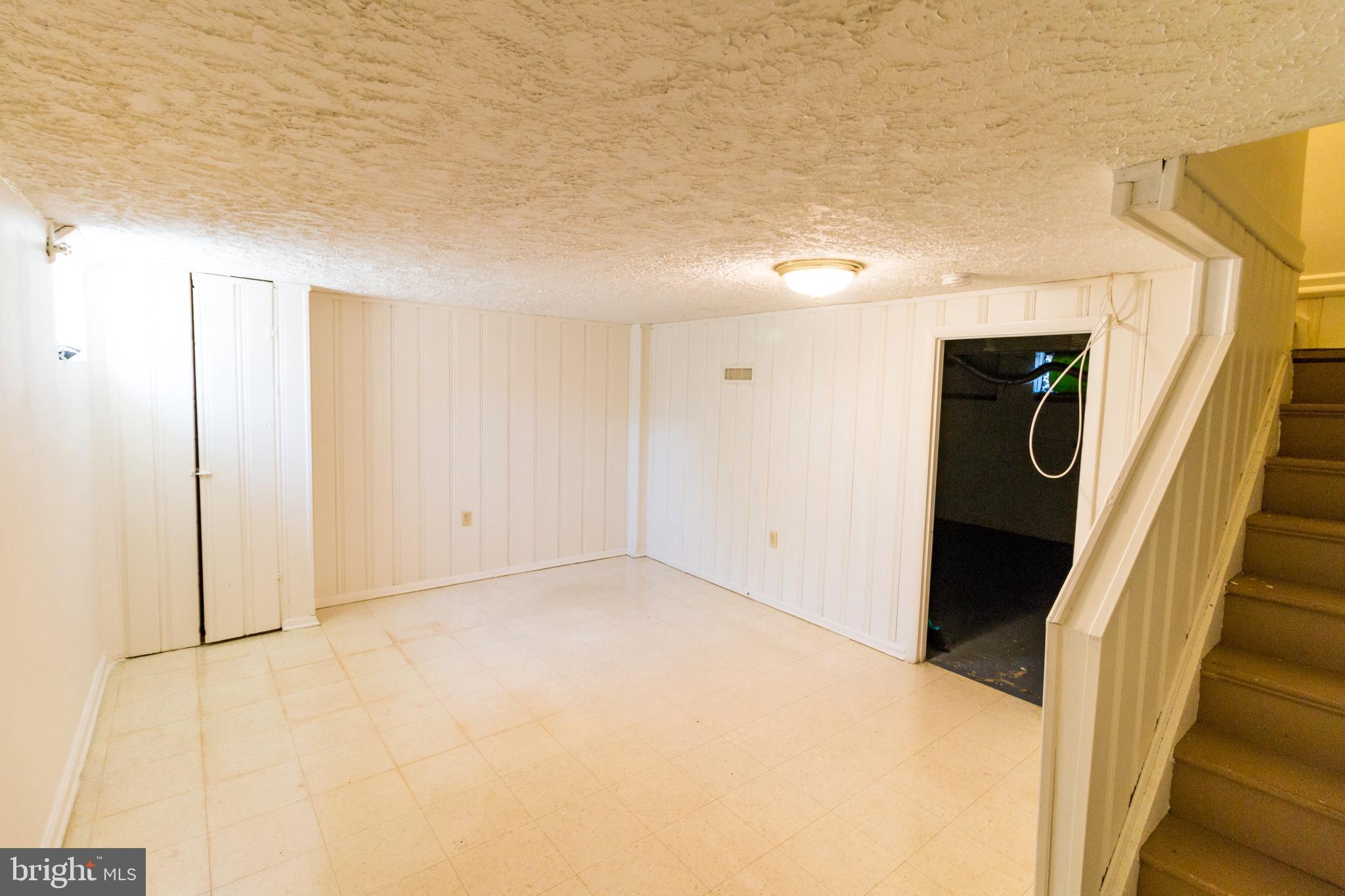 136 Bladen Road Baltimore, MD 21221 - Photo 18 of 23 lower level rec room