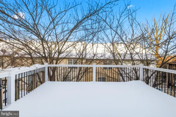 a view of deck with trees