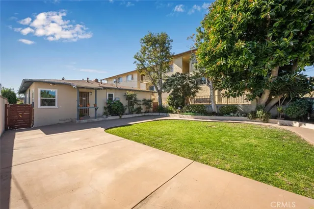 a view of backyard with a garden and outdoor space