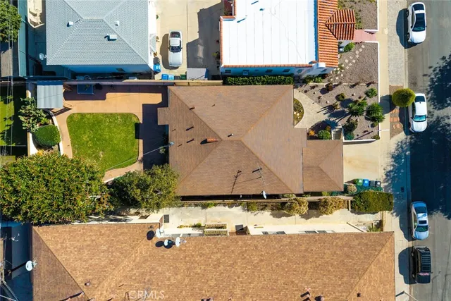 an aerial view of a house with outdoor space