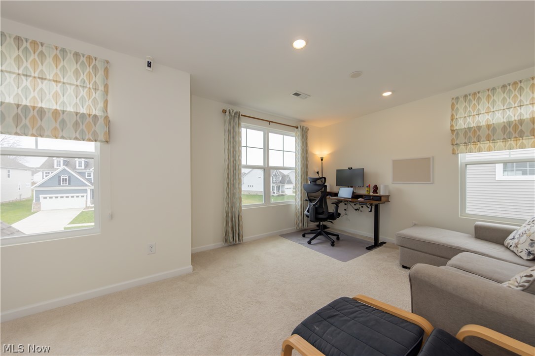 766 River Run Road Aurora, OH 44202 - Photo 26 of 49 Second floor office/study area featuring light colored carpet, plenty of natural light, and recessed lighting