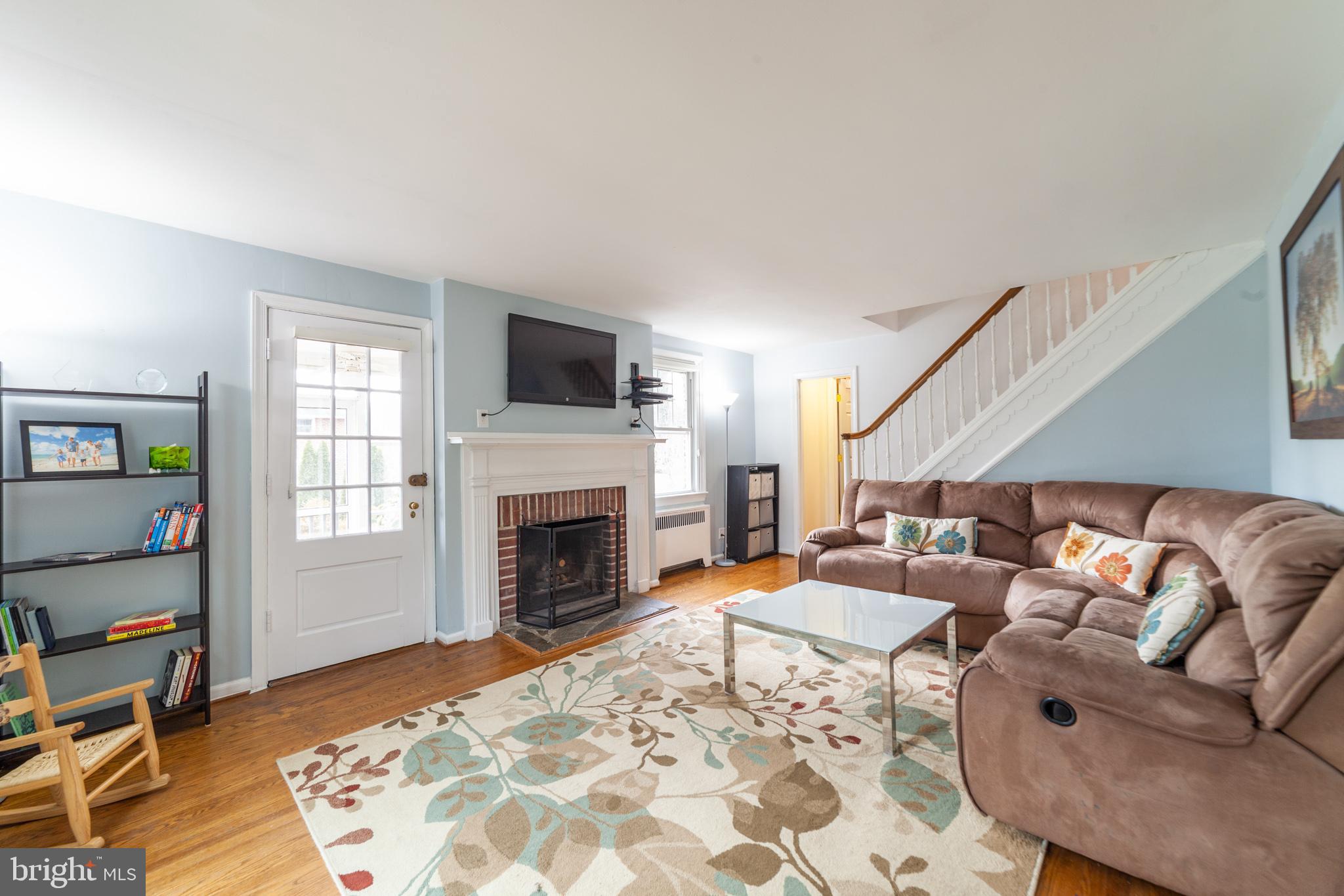 5 Green Valley Road Wallingford, PA 19086 - Photo 3 of 24 Living Room with Fireplace