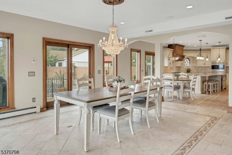 656 Lakeside Avenue Hopatcong, NJ 07821 - Photo 12 of 36 a view of a dining room with furniture window and outside view