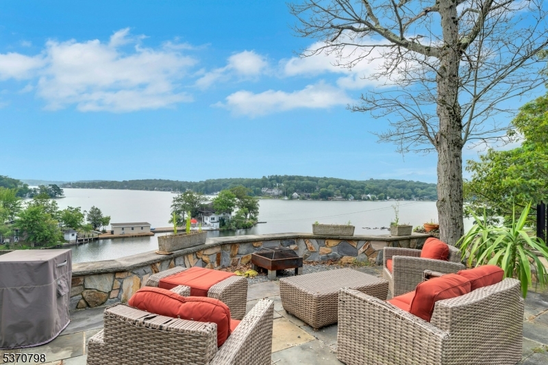656 Lakeside Avenue Hopatcong, NJ 07821 - Photo 14 of 36 a view of a roof deck with couches and city view