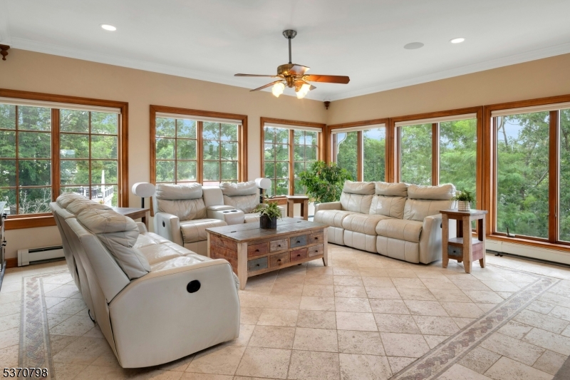 656 Lakeside Avenue Hopatcong, NJ 07821 - Photo 19 of 36 a living room with furniture and a large window