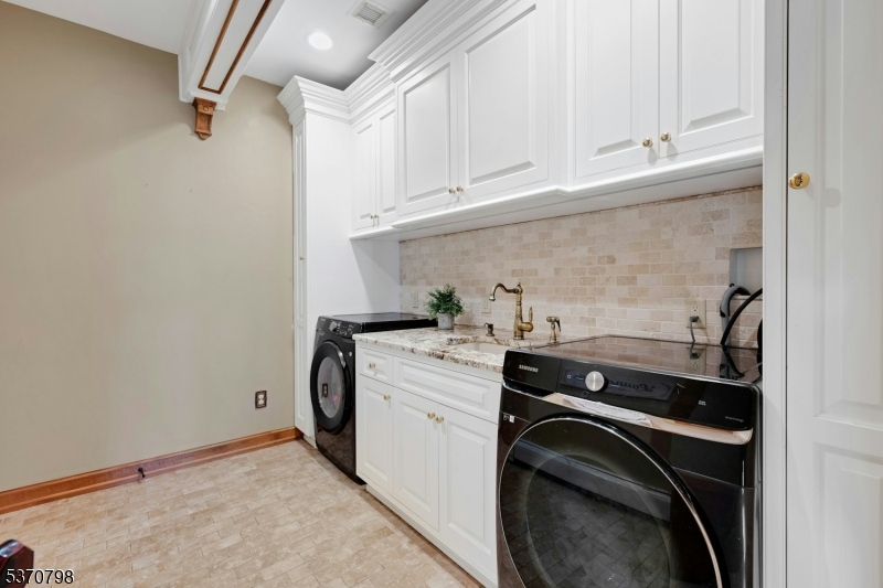 656 Lakeside Avenue Hopatcong, NJ 07821 - Photo 36 of 36 a utility room with dryer and washer