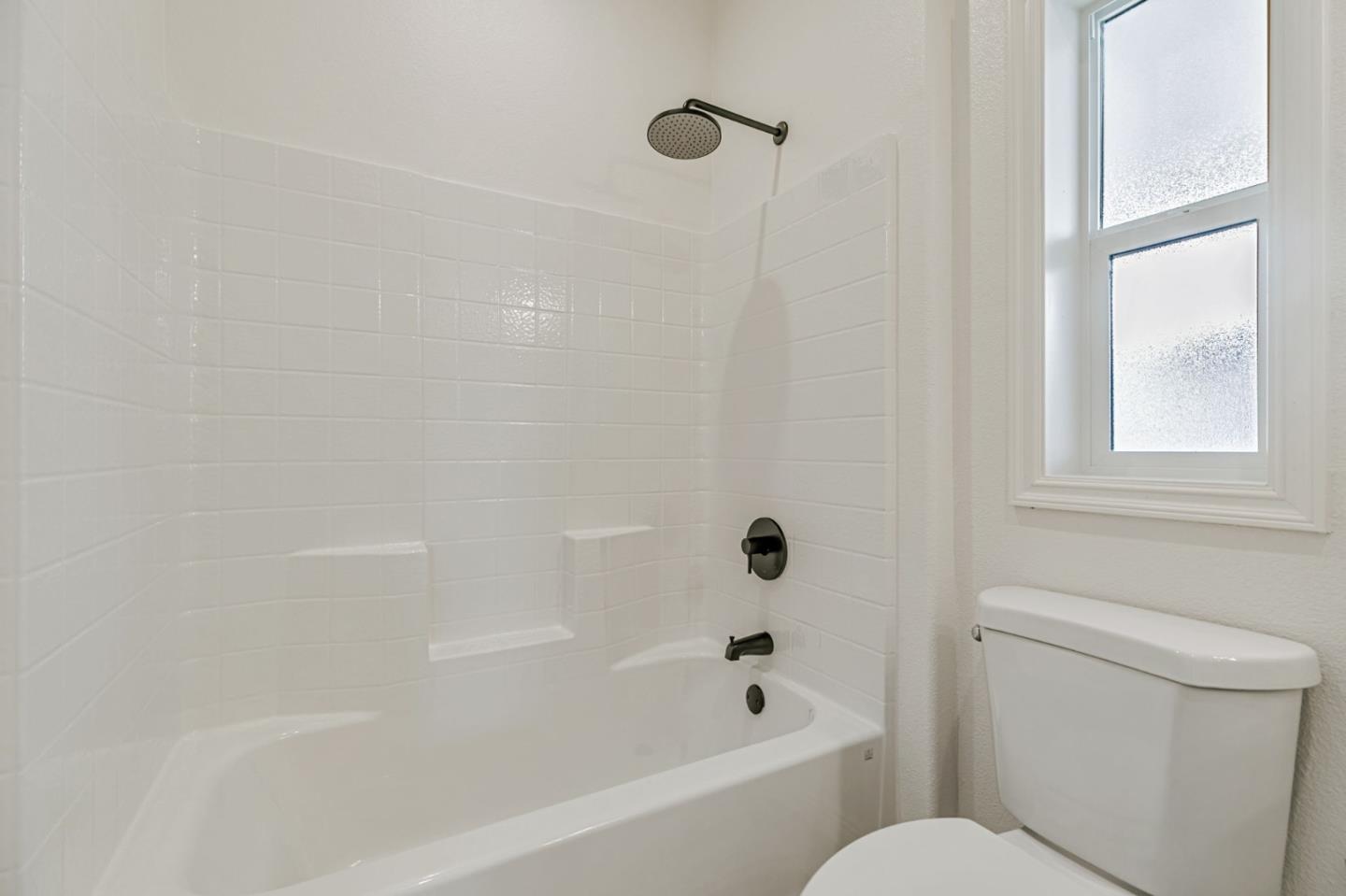 555 Umbarger Road, Unit 131 San Jose, CA 95111 - Photo 25 of 32 a bathroom with a toilet and a bathtub
