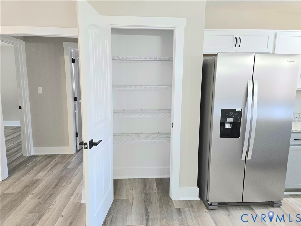 1781 Bumpass Road Bumpass, VA 23024 - Photo 16 of 26 a view of a kitchen from a hallway
