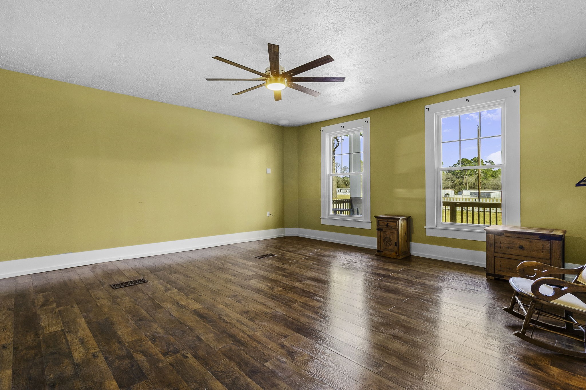 500 Highway 156 Point Blank, TX 77364 - Photo 13 of 50 a view of livingroom with hardwood floor and ceiling fan