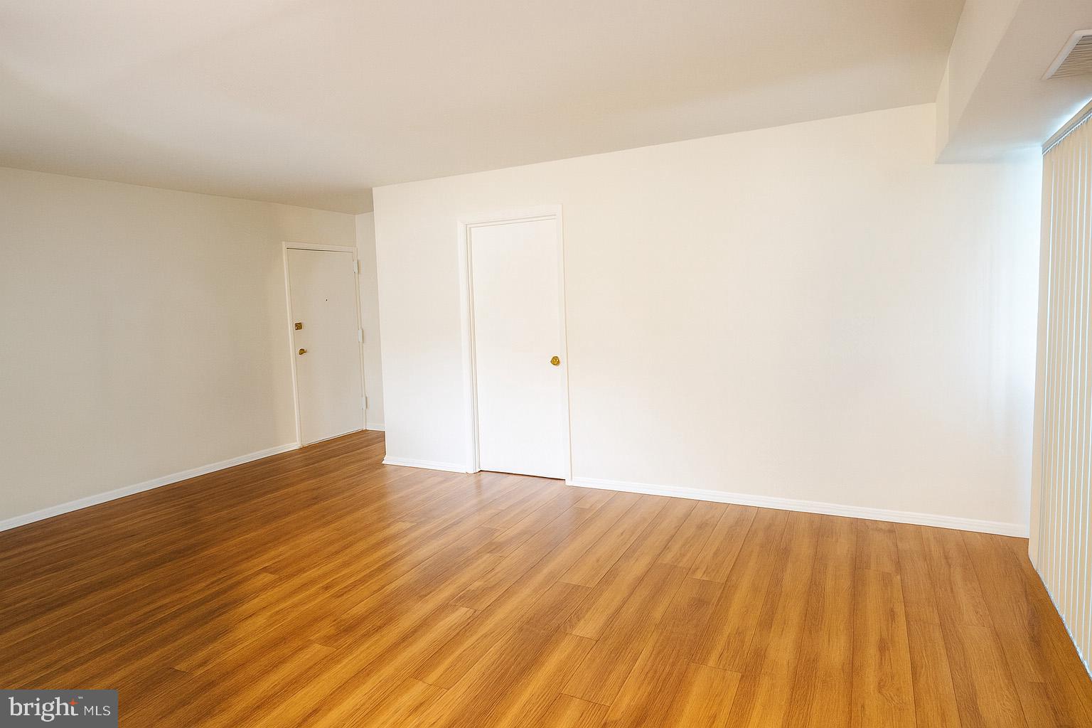 2906 Kings Chapel Road, Unit 6/4 Falls Church, VA 22042 - Photo 4 of 17 a view of empty room with wooden floor