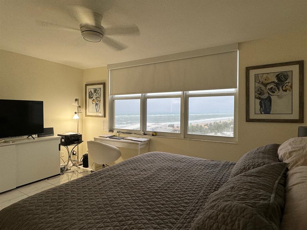 305 North Pompano Beach Boulevard, Unit 1006 Pompano Beach, FL 33062 - Photo 15 of 42 a living room with furniture and a flat screen tv