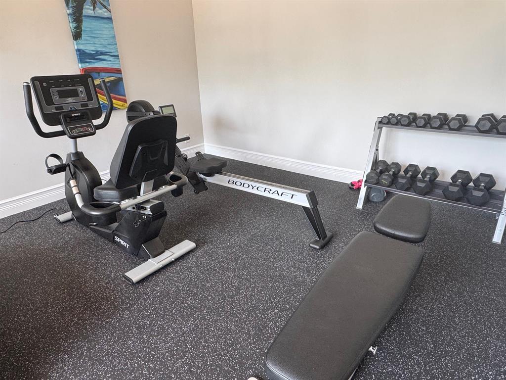 305 North Pompano Beach Boulevard, Unit 1006 Pompano Beach, FL 33062 - Photo 39 of 42 a view of workspace with gym equipment
