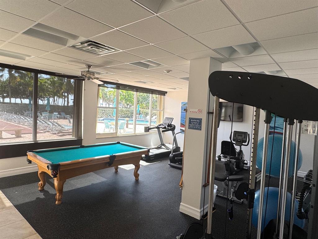305 North Pompano Beach Boulevard, Unit 1006 Pompano Beach, FL 33062 - Photo 41 of 42 a room with gym equipment and large window