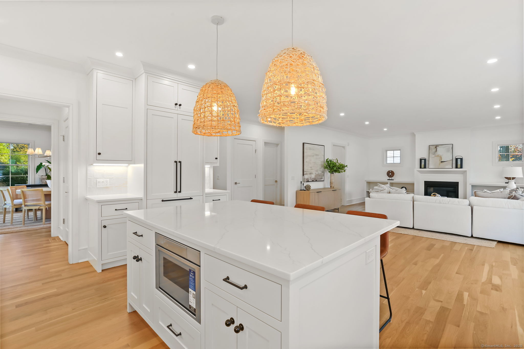 31 High Ridge Road Fairfield, CT 06825 - Photo 11 of 37 a large white kitchen with lots of counter space and wooden floor