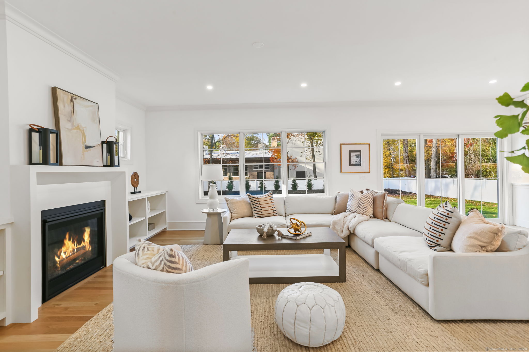 31 High Ridge Road Fairfield, CT 06825 - Photo 15 of 37 a living room with furniture and a fireplace