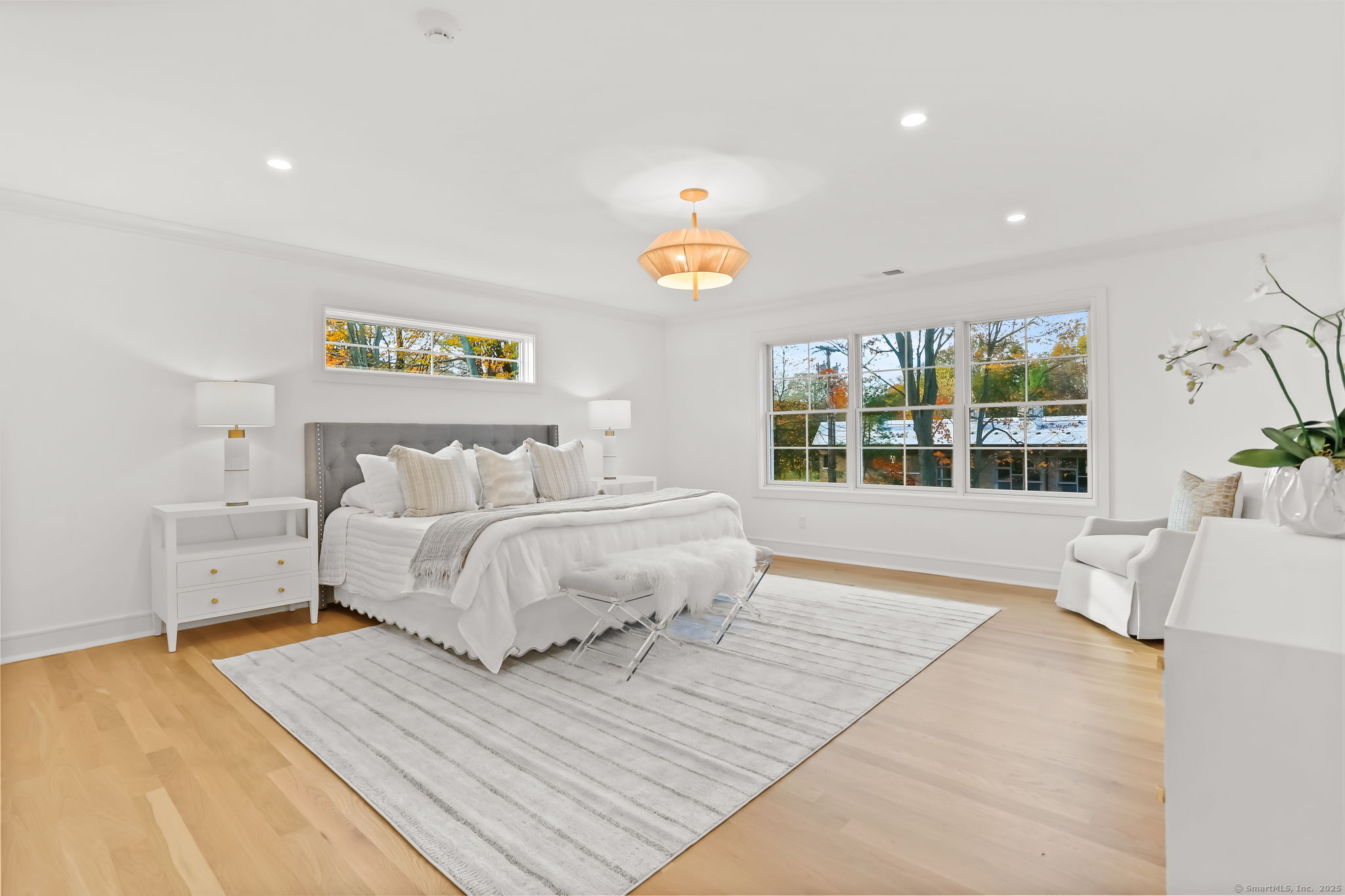 31 High Ridge Road Fairfield, CT 06825 - Photo 18 of 37 a bedroom with a large bed and a window