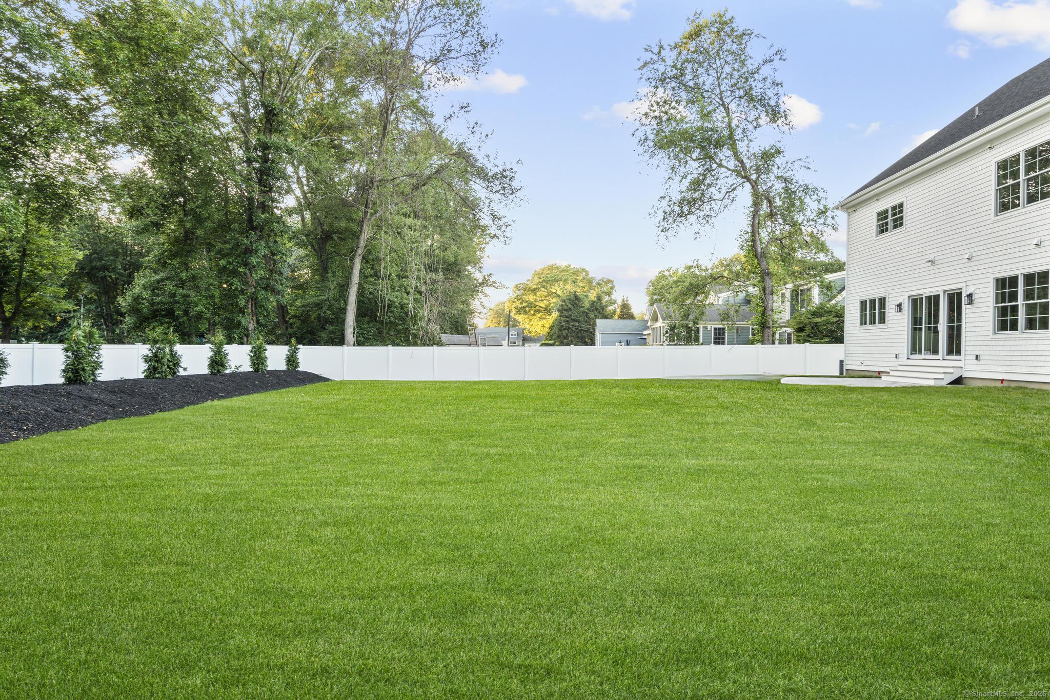 31 High Ridge Road Fairfield, CT 06825 - Photo 36 of 37 a view of yard with grass and trees