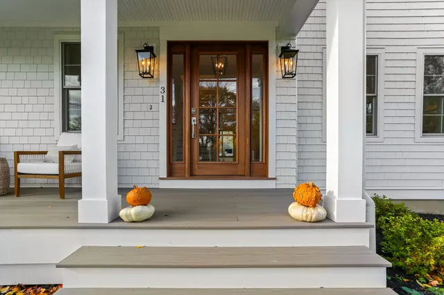 a view of a living room and entryway