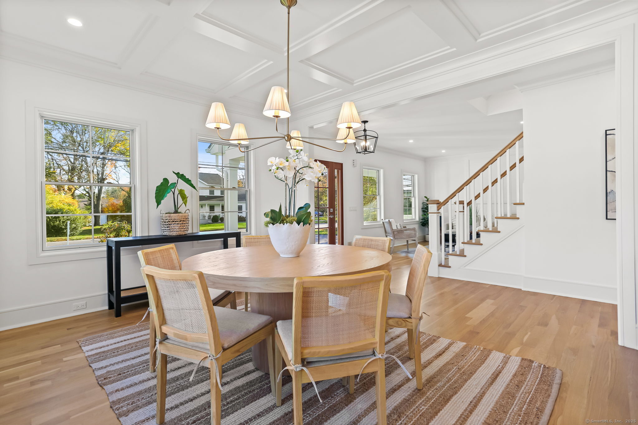 31 High Ridge Road Fairfield, CT 06825 - Photo 8 of 37 a view of a dining room with furniture window and wooden floor