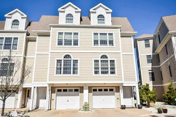 a front view of a building with a street